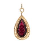 Tourmaline, Diamond, 14k Yellow Gold Pendant. Centering one pear-cut tourmaline weighing