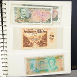 Worldwide Paper Money (58).  Bills Including Cuba, Mexico & Russia in a binder.