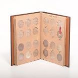 US 1878-1893 Morgan Dollars.   Complete collection in coin book, total of 60 coins.