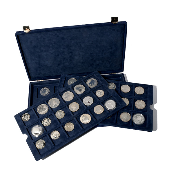 Collection of 50 Silver Coins of the World.   In a blue presentation box.