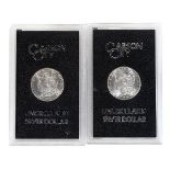 1883 CC and 1884 CC Carson City Morgan Dollars. Both uncirculated with boxes.