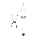 Pair of Georg Jensen Sugar Tongs and C.A. Stevens & Co. Sterling Silver Invalid Feeder {Total silver