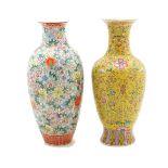 Two Famille Rose Vases The first decorated with a mille fleur pattern within ruyi-head and lappet