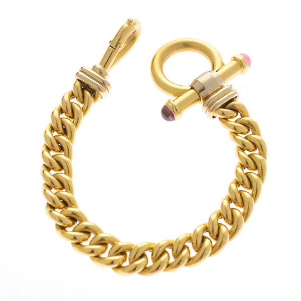 Signorettie Tourmaline, 18k Yellow Gold Bracelet. The 18k yellow gold curb link measuring