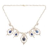 Sapphire, Diamond, 14k White Gold Necklace. Featuring three oval sapphire cabochons ranging in