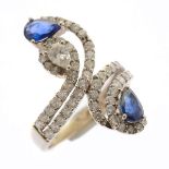 Sapphire, Diamond, 18k White Gold Ring. Featuring two pear-cut sapphires weighing a total of