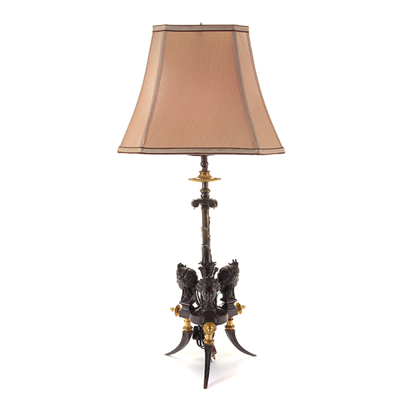 Aesthetic Movement Gilt and Patinated Bronze Figural Lamp, fitted with a bronze harp cage frame with