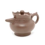 A Yixing Clay Teapot Potted in the form of a 'monk's cap' with a bulbous body and tapering mouth,