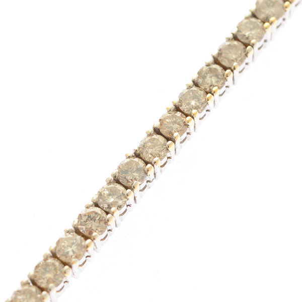 Diamond, 14k White Gold Bracelet. Featuring sixty full-cut diamonds weighing a total of