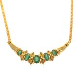 Emerald, Diamond, 14k Yellow Gold Necklace. Featuring five oval-cut emeralds weighing a total of