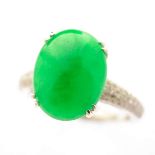 Jade, Diamond, 14k White Gold Ring. Featuring one oval jadeite cabochon, measuring approximately