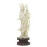 A Jade Carving of Guanyin, 20th Century   A Jade Carving of Guanyin Carved standing dressed in