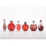 Six Red Glass Snuff Bottles, 19th Century   Six Red Glass Snuff Bottles The first is a teardrop
