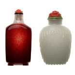 Two Glass Snuff Bottles, 19th Century   Two Glass Snuff Bottles The first a rectangular footed