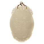 A White Jade Pendant   A White Jade Pendant The oval-shaped pendant carved with boys in leisurely