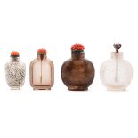 Four Quartz Snuff Bottles, 19th Century   Four Quartz Snuff Bottles This comprises two smoky