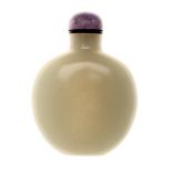 A White Jade Snuff Bottle   A White Jade Snuff Bottle Of flattened ovoid form with a flat base,