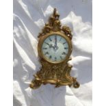 A 20thC Imperial brass cased striking mantel clock