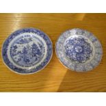 An 18thC Chinese blue & white porcelain plate decorated in willow pattern and another decorated with