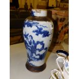 An Oriental blue & white crackle glaze vase decorated figures with bronze coloured borders – rim