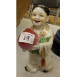 Two early 20thC Chinese porcelain figures – Boy holding giant pomegranate – one damaged