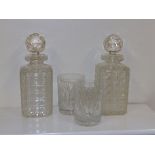 A pair of cut glass spirit decanters and two tumblers (4)