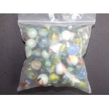 A quantity of old glass marbles