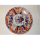 An Imari fluted porcelain plate