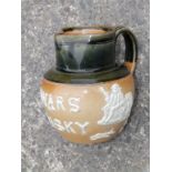 A Royal Doulton stoneware Dewars Whisky hunting jug