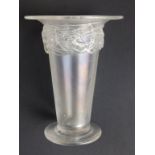 A 1930's colourless iridescent glass trumpet vase, having trailed applied decoration beneath rim,