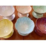 A set of six harlequin coloured Beswick grapefruit dishes