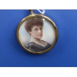 An Edwardian watercolour miniature – Portrait of a young woman – cut down to fit into later circular