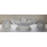 A Georgian cut glass fruit bowl, 16” across, together with a pair of matching lidded bowls on stands