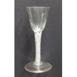 An 18thC wine glass with fluted round funnel bowl on double series opaque twist stem to plain