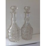 A pair of 19thC cut glass decanters