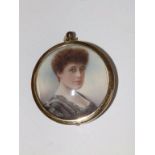 An Edwardian watercolour miniature – Portrait of a young woman – cut down to fit into later