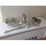 Two pairs of silver napkin rings, a silver dish and other items