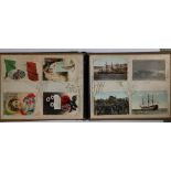 A lacquered early 20thC Japanese postcard album containing approximately 65 cards including