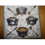 A cased set of four French art nouveau silver salts with spoons