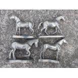 A set of four 20thC pewter horses by Ken Dixon