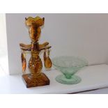 An amber glass candlestick with drops and an etched bowl (2)