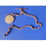 An Edwardian gold sovereign on 9ct gold watch chain