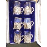 A pierced silver liqueur set with glass liners in case – London 1903