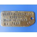 A brass servant's pass – 'James Plantation, Virginia 1853'