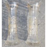 A pair of cut glass vases with gilt decoration