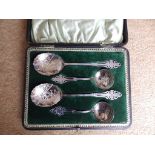 A cased EP four piece dessert spoon set