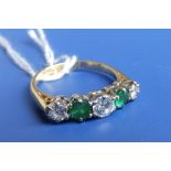 A five stone emerald & diamond 18ct gold ring