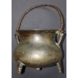 A 16thC bronze cauldron, of pot-bellied form with a pair of angular handles, cast maker's mark