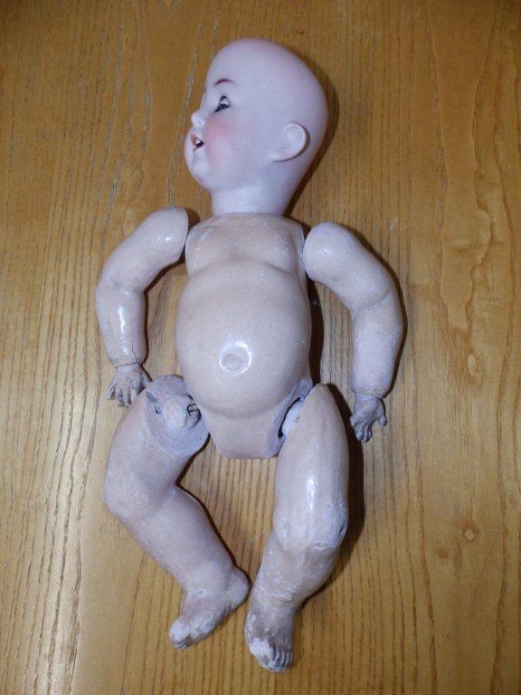 A bisque head baby girl doll by Bergmann
