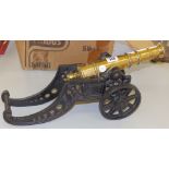 A brass model cannon